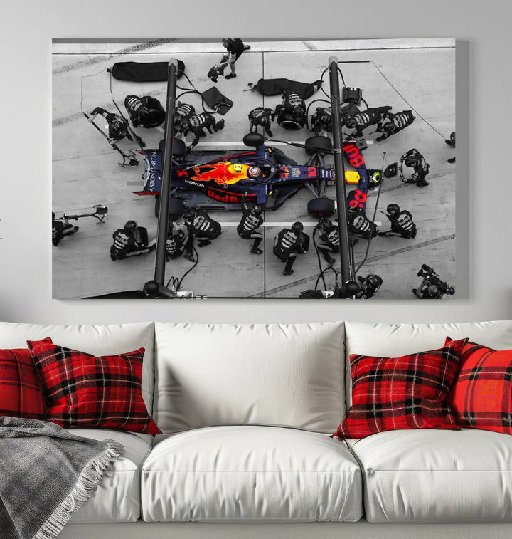 The RedBull Formula 1 Canvas Wall Art Print, a set of three gallery-quality pieces, elegantly adorns the wall.