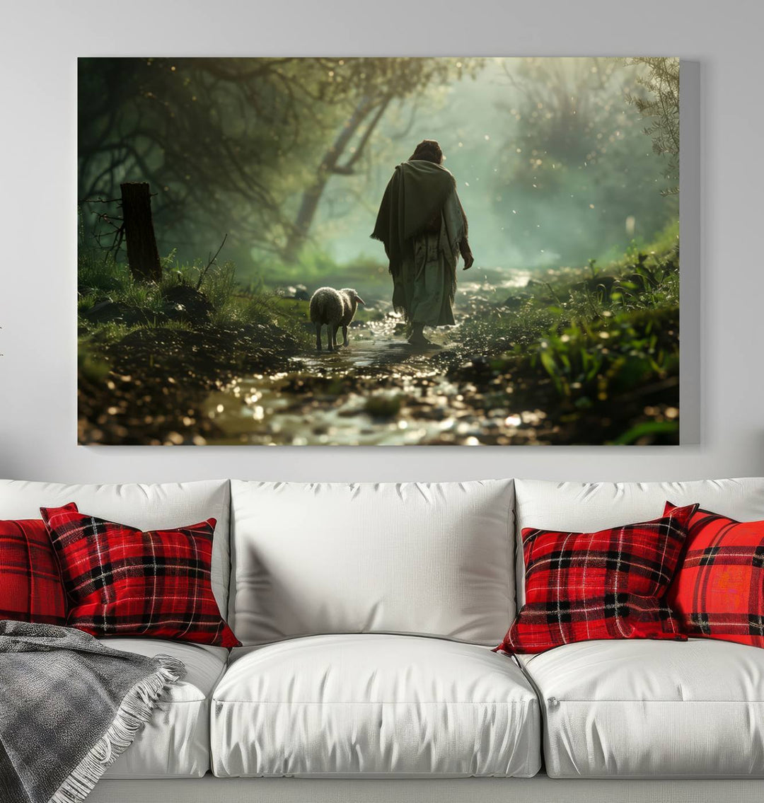 The wall art piece, titled "Jesus Shepherd a Lost Lamb Canvas Wall Art Print," is suspended on the wall and depicts a robed figure and a lamb wandering along a forest path.