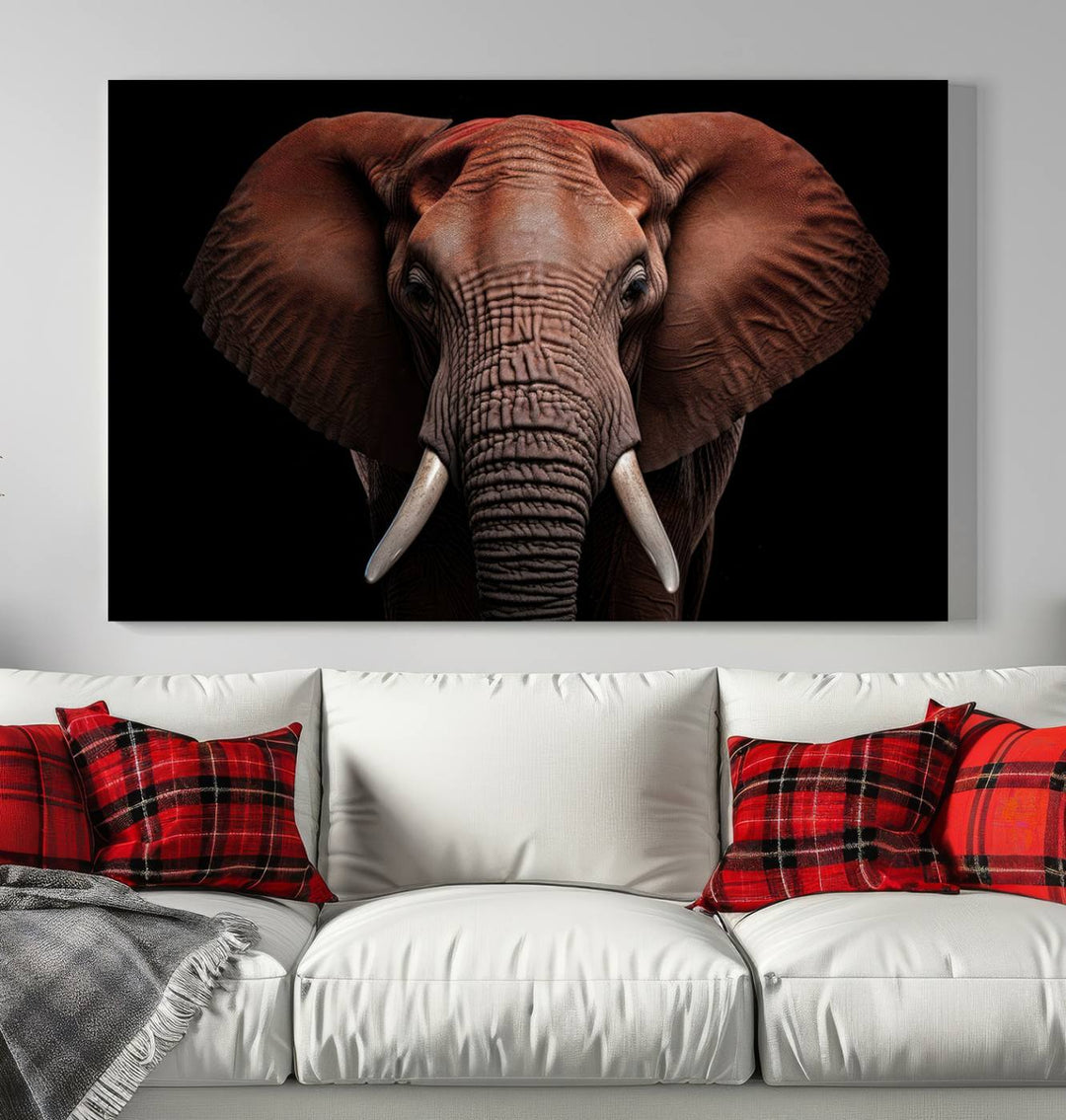 A stunning triptych titled "Wild Elephant Wall Art Canvas Print" beautifully enhances the wall above a contemporary living room. This Africa Savannah Wild Animal Wall Decor Print is of museum-quality, complete with a UV-protective coating to ensure its vibrancy and beauty are preserved for years.