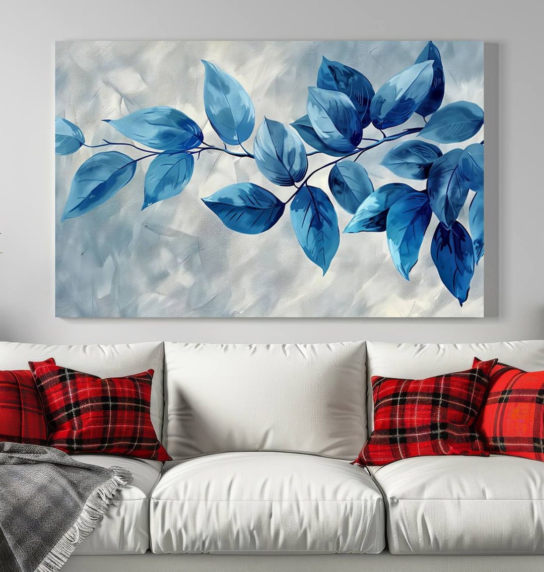 A Blue Leaf Abstract Wall Art Canvas Print, featuring a textured background and gallery-quality finish, is displayed.