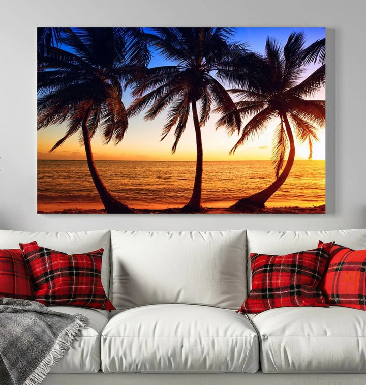 The living room features a wall adorned with the "Wall Art Canvas Curve Palms at Sunset on Beach," showcasing gallery-wrapped, museum-quality canvases in a stunning triptych.