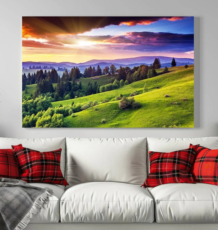 The room features a large triptych of the Green Hills and Sunset Wall Art Print, showcasing a scenic landscape with lush greenery and a vibrant sky.