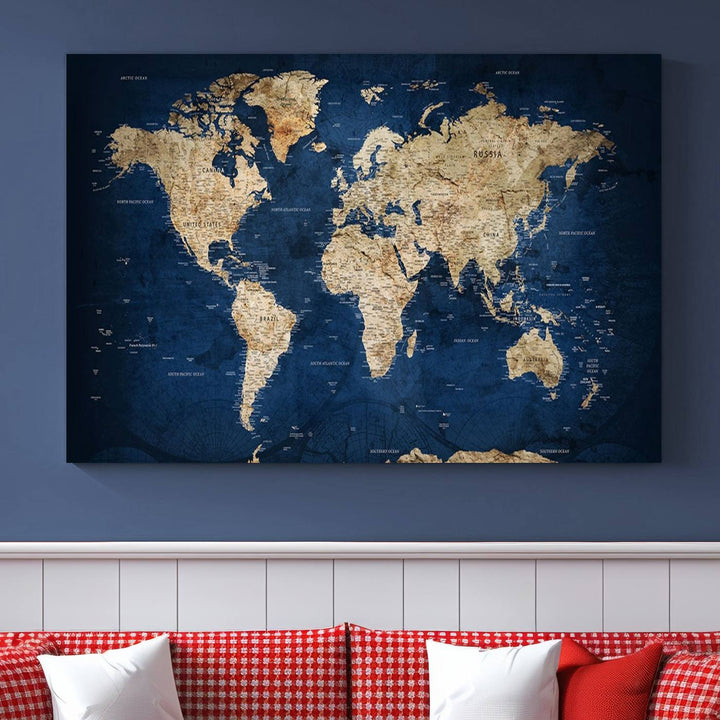 A triptych canvas print titled "Vintage Blue World Map Canvas Print - Classic World Map Design on Deep Blue Wall Art Print" adorns the wall, enhancing the decor with its antique style.