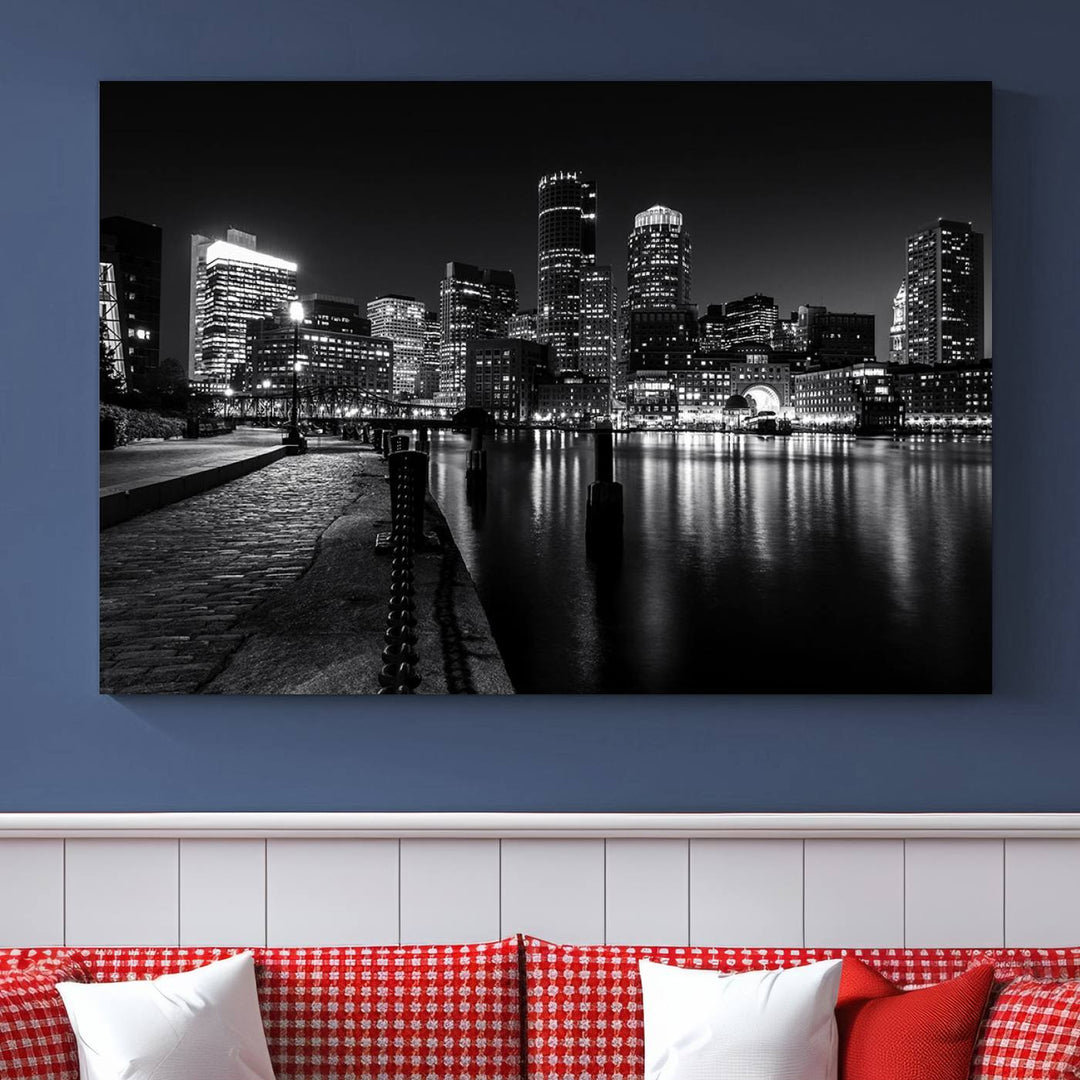 The Boston Lights Skyline Black and White Wall Art Cityscape Canvas Print, crafted with museum-quality canvas and UV-protective coating, serves as a striking triptych centerpiece in the living room.