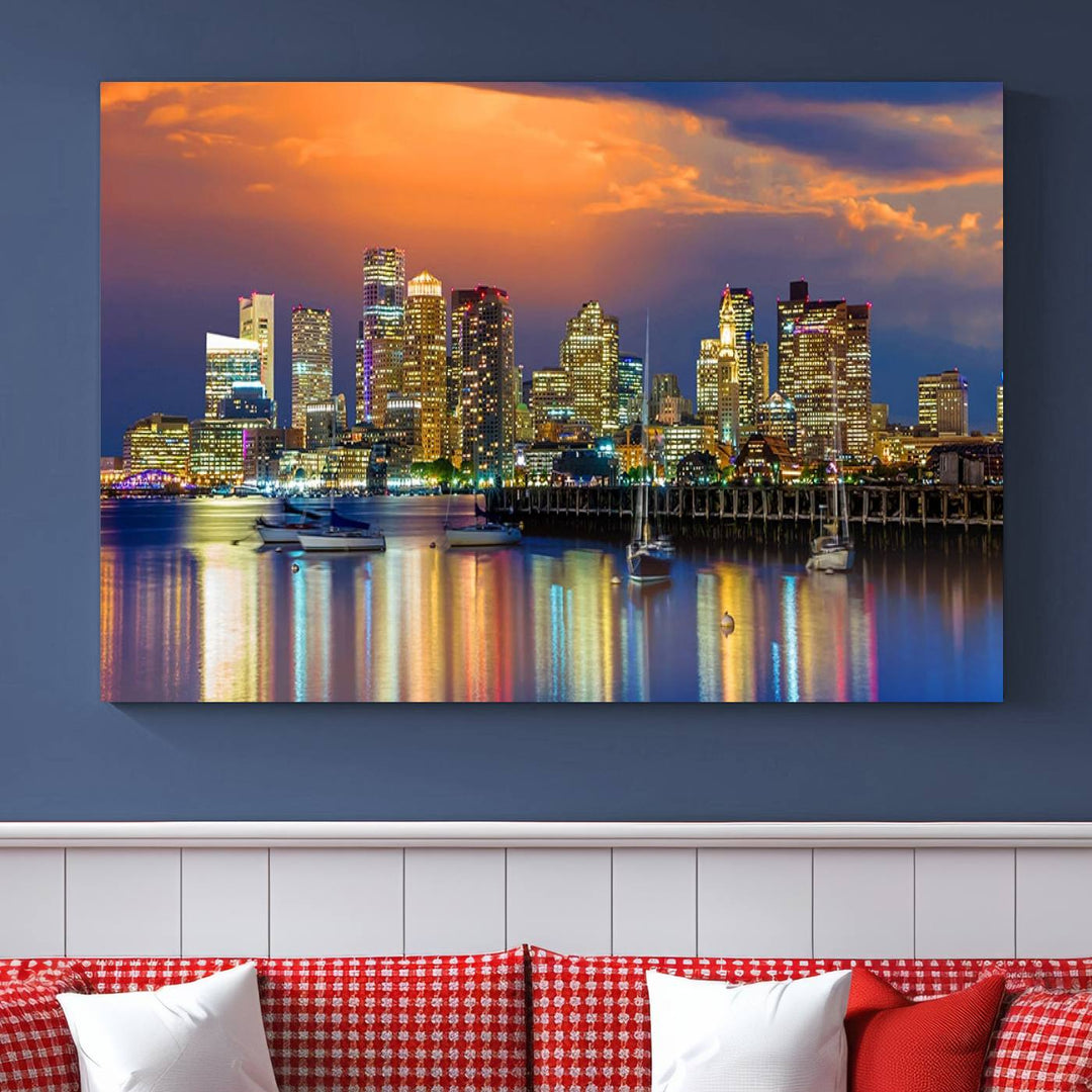 A contemporary dining area features a large triptych wall art of the Boston City Night skyline in blue and orange hues, printed on museum-quality canvases to ensure lasting beauty.