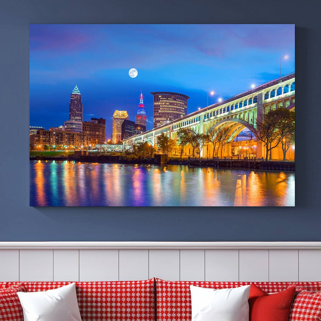 The Cleveland Night Skyline Wall Art City Cityscape Canvas Print portrays a city skyline and bridge lit up against the night sky. This artwork is printed on museum-quality canvas with a gallery-wrapped finish and features a UV-protective coating to ensure lasting vibrancy.