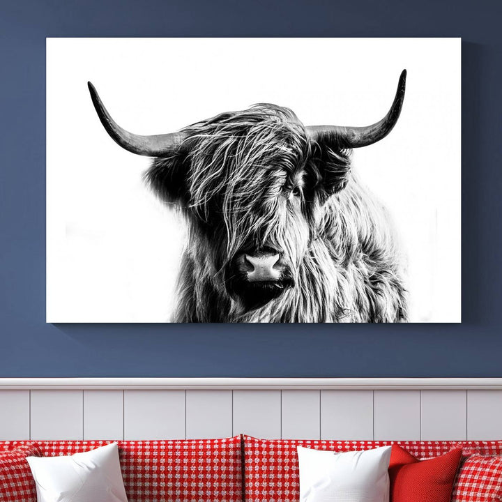 The Scottish Highland Cow Cattle Art Print Farmhouse Wall Art Canvas Print enhances rustic farmhouse decor with its depiction of a long-haired, large-horned cow. This triptych is an ideal choice for chic wall art.