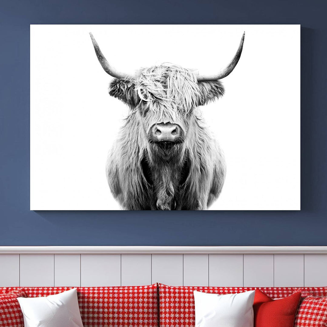 The wall art features a triptych of a Scottish Highland cow, printed on museum-quality canvases with a UV-protective coating. This decorative piece is known as the Highland Cow Canvas Wall Art Farm House Wall Art.