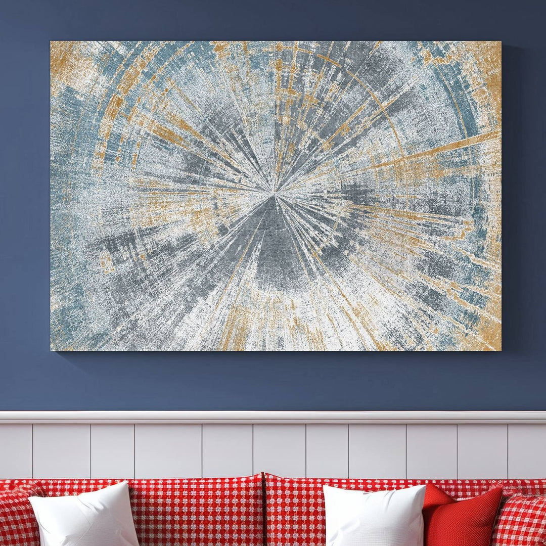 The Radiant Abstract Wood Rings Canvas Art, a modern triptych wall decor, enhances the contemporary style of the living room with its blue, white, and gold hues.