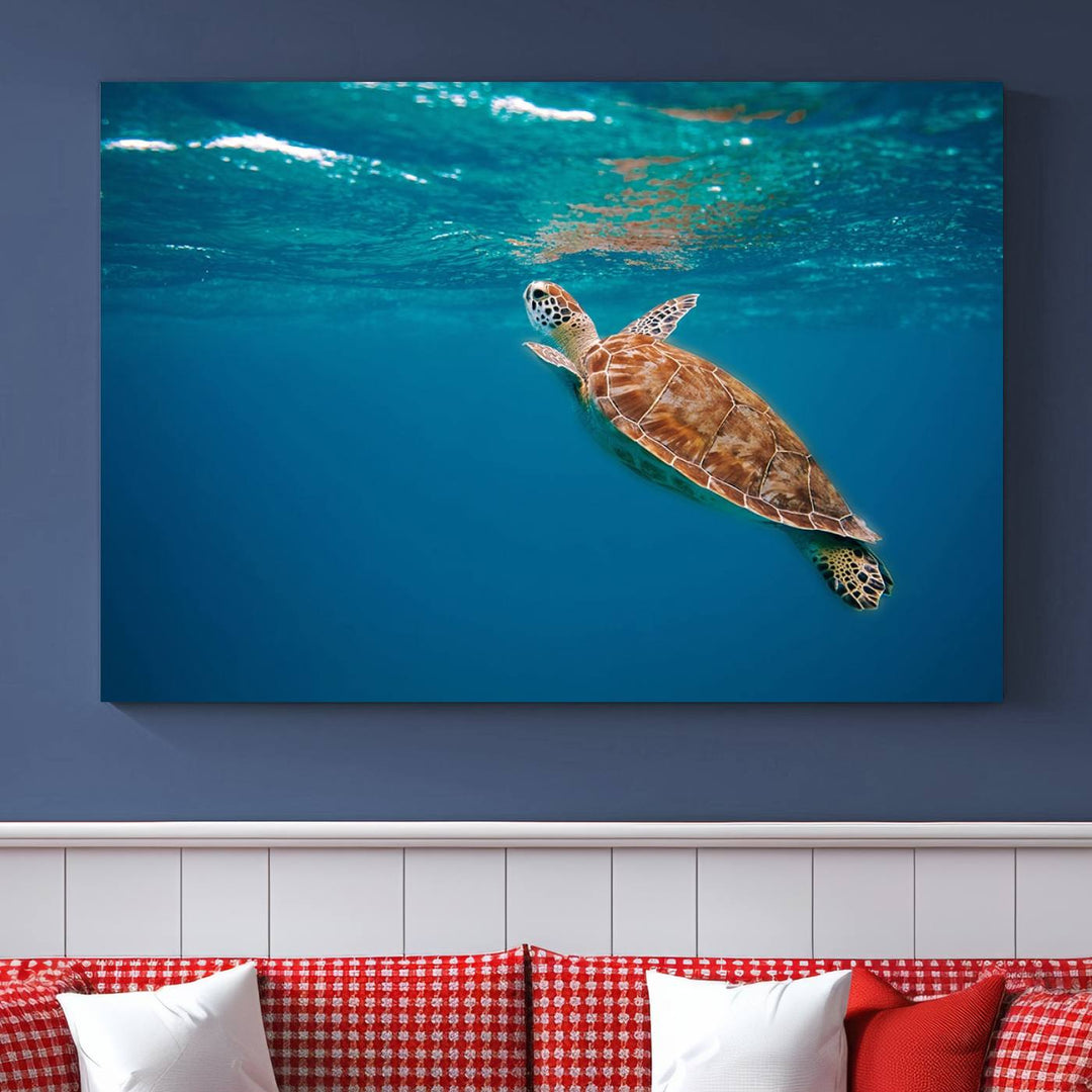 The living room features the "Baby Turtle in Ocean" wall art canvas print. This gallery-quality piece, depicting a sea turtle swimming underwater, adds an elegant touch to the space.