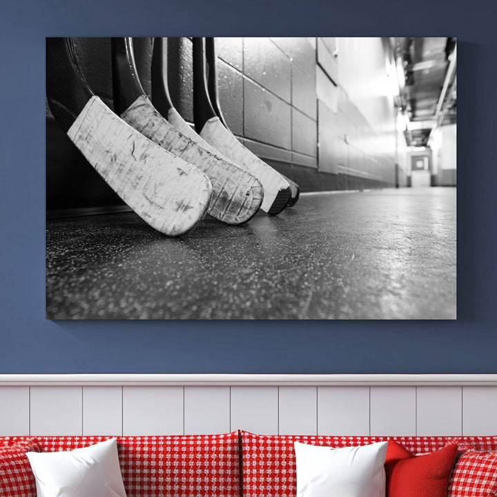 A living room featuring a large Ice Hockey Wall Art Canvas Print on gallery-wrapped canvas.