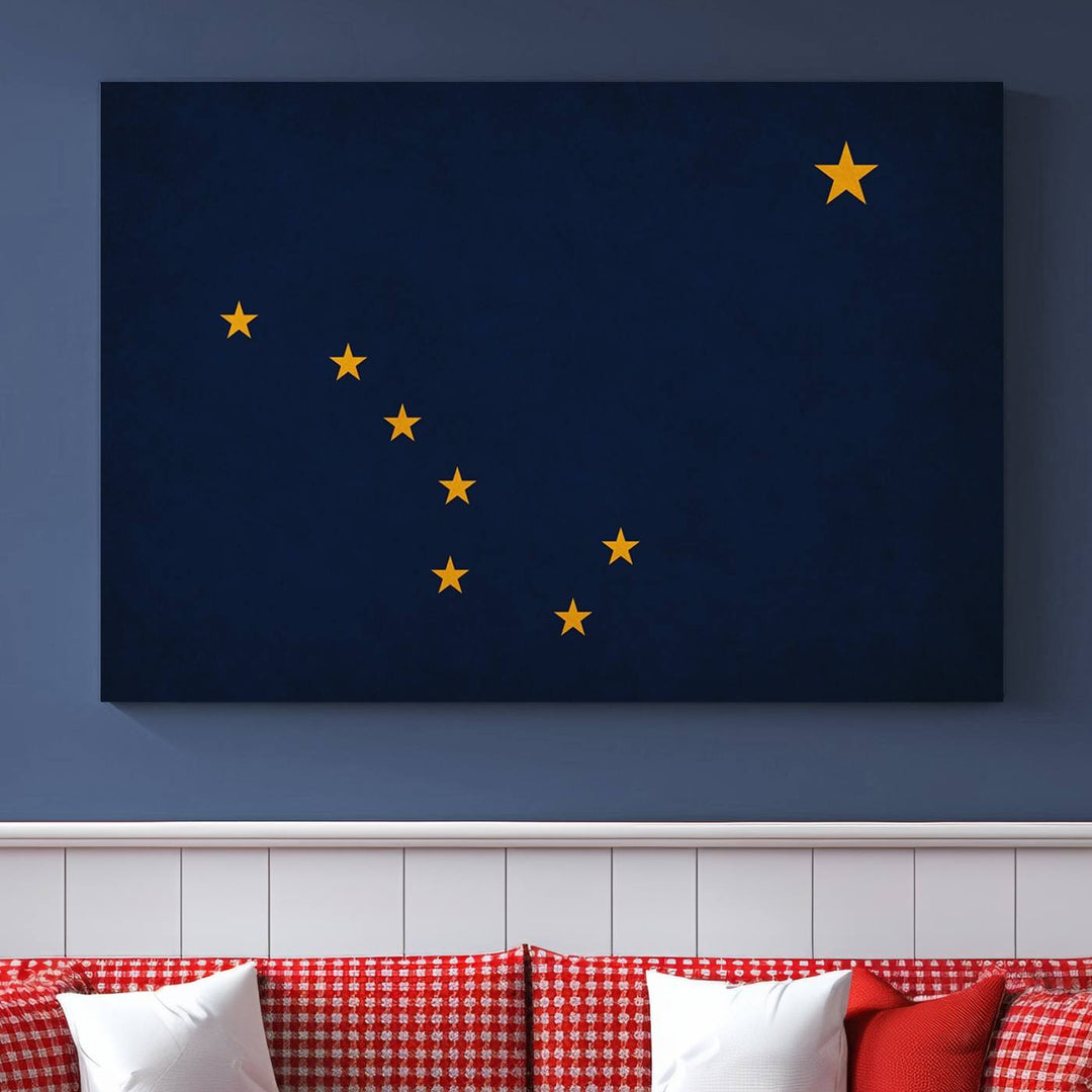 A contemporary living room featuring a triptych artwork of stars on a navy background, accentuated by the striking Alaska States Flag Wall Art Canvas Print.