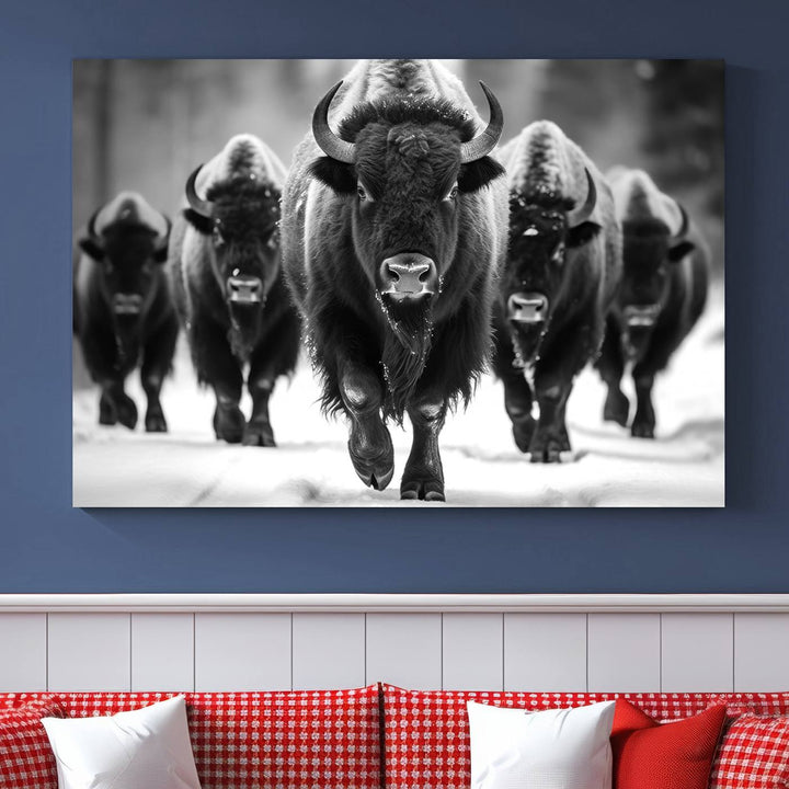 A modern living room features a striking black-and-white American Bison Art | Buffalo Herd Wall Art Canvas Print on the wall.