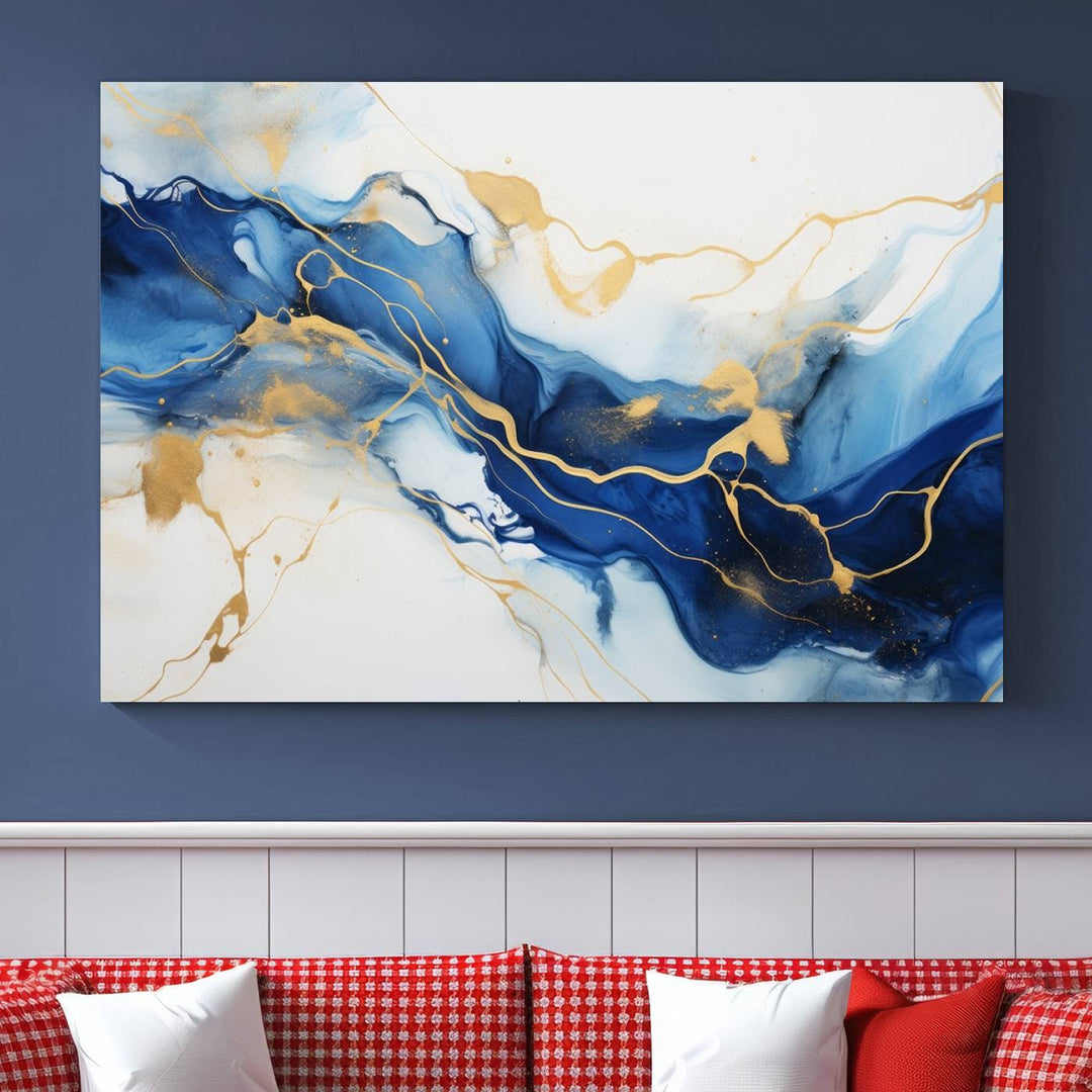 The Blue Abstract Wall Art is displayed as a triptych on museum-quality canvas, showcasing a blue and gold abstract design. The artwork includes a UV-protective coating to maintain its vibrancy and comes with the benefit of free shipping.