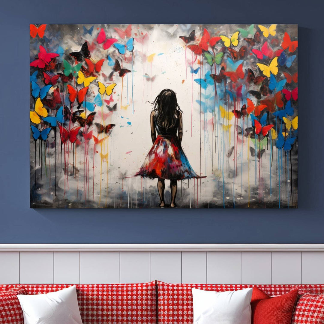 The Girl Butterfly Graffiti Abstract Canvas Print, featuring a vibrant depiction of a girl surrounded by butterflies on museum-quality canvas, is displayed prominently.