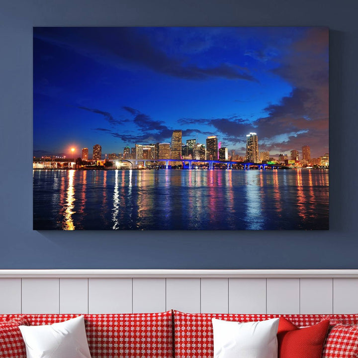 A large Miami City View Wall Art Canvas Print featuring the Miami City Skyline Panorama at night is displayed above the dresser.