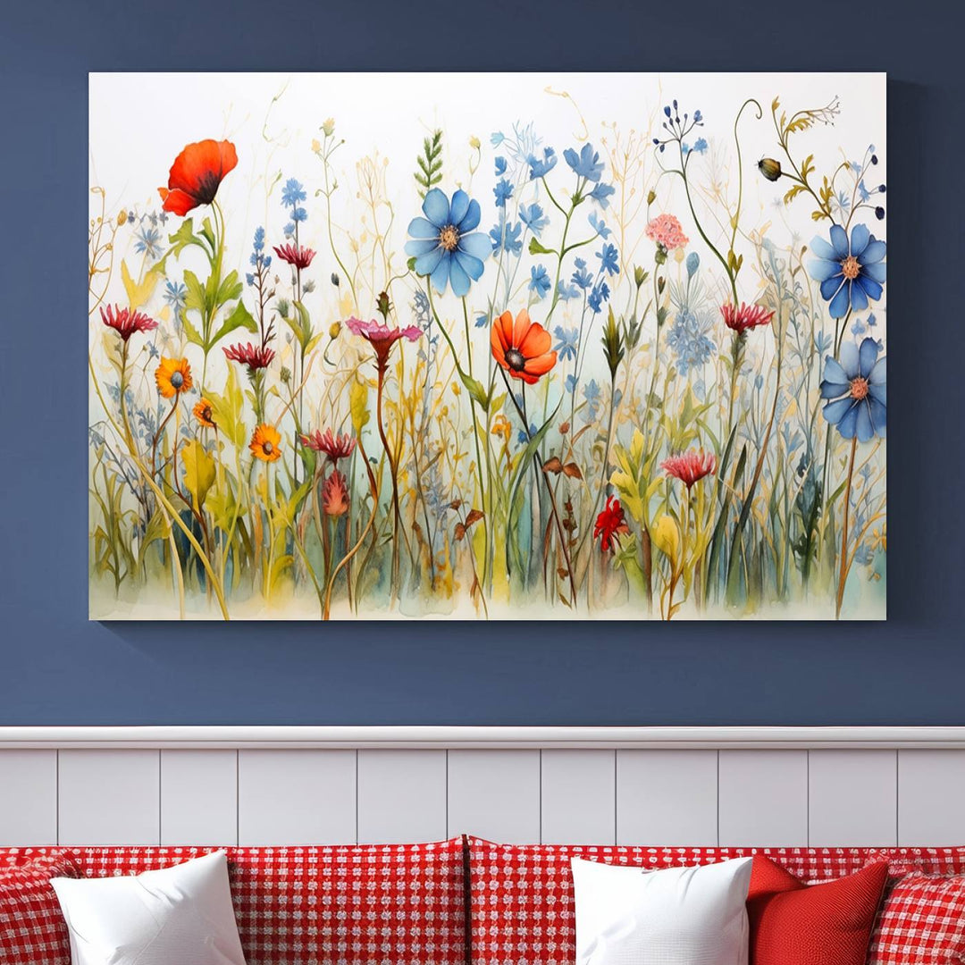 The Colorful Wildflower Canvas Wall Art – Vibrant Floral Botanical Print, consisting of a large 3 panel set, adds bright nature decor to the living room against a black wall.