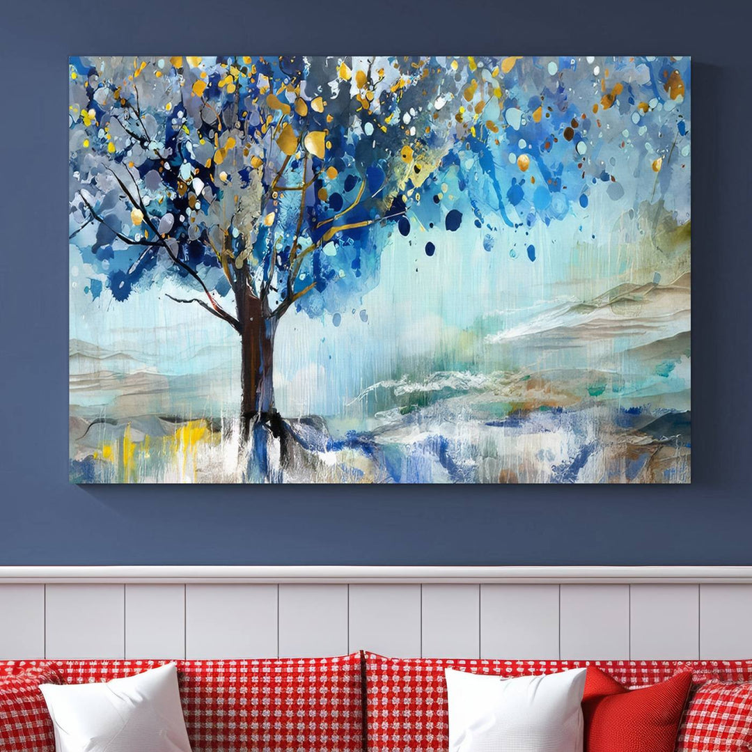 A modern living room features a three-panel Watercolor Style Abstract Tree Printing Wall Art Canvas in vibrant blue and yellow, crafted on museum-quality material.