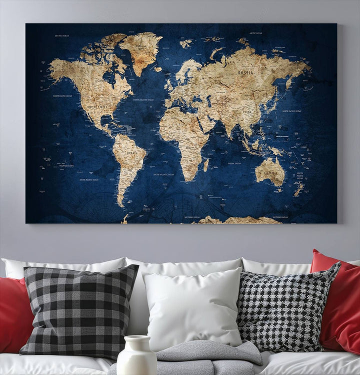 A triptych canvas print titled "Vintage Blue World Map Canvas Print - Classic World Map Design on Deep Blue Wall Art Print" adorns the wall, enhancing the decor with its antique style.