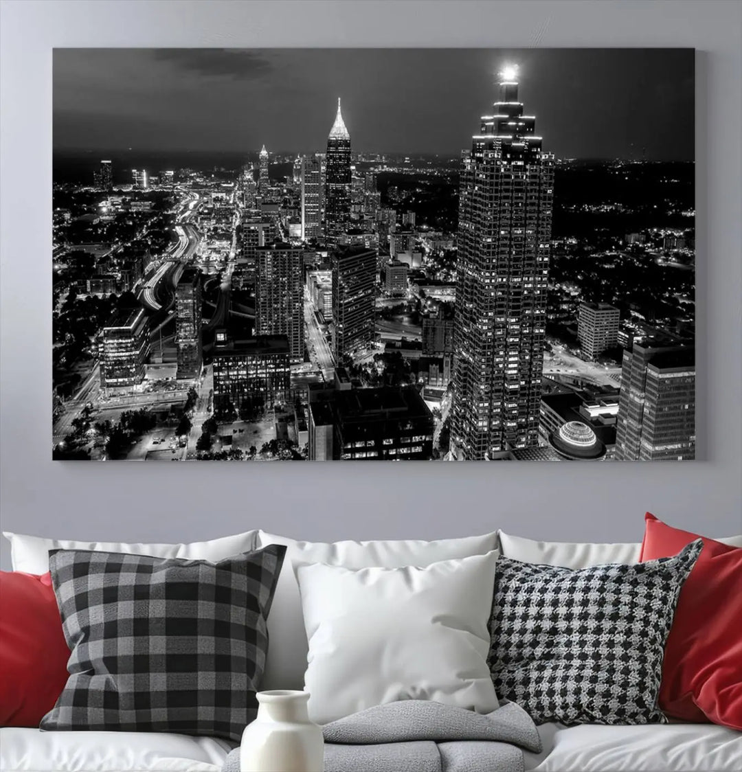 The Atlanta City Lights Skyline Black and White Wall Art Cityscape Canvas Print is elegantly displayed on the wall. These museum-quality canvases arrive ready to hang, making your art display both effortless and sophisticated.