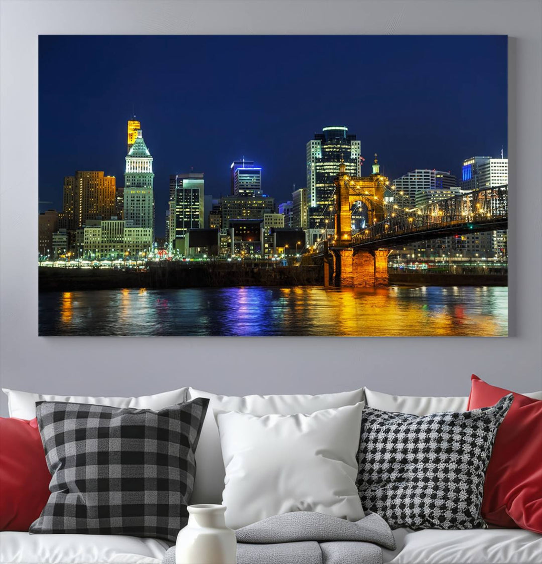 The "Cincinnati City Lights Night Skyline Cityscape" canvas print, displayed above a sofa, exhibits museum-quality craftsmanship with a UV-protective coating.