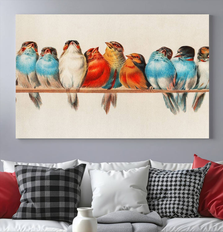 The Abstract Birds Wall Art Canvas Print, featuring a triptych of colorful birds perched on a branch, is printed on museum-quality canvas and equipped with a UV-protective coating and ready-to-hang design. This artwork adds vibrant elegance to your living space.