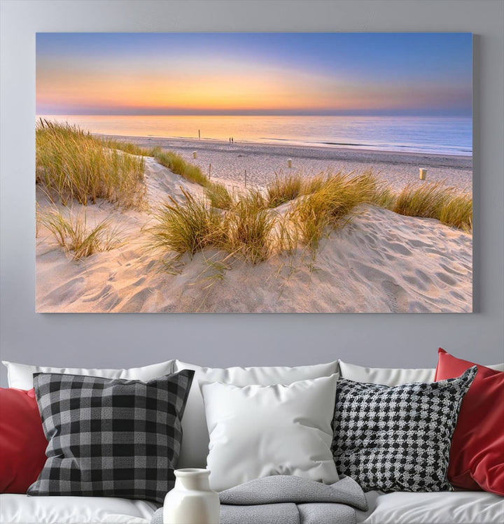 The "Sunset Silence on the Beach" wall art canvas print features a serene beach scene at sunset on museum-quality canvas with a UV-protective coating.