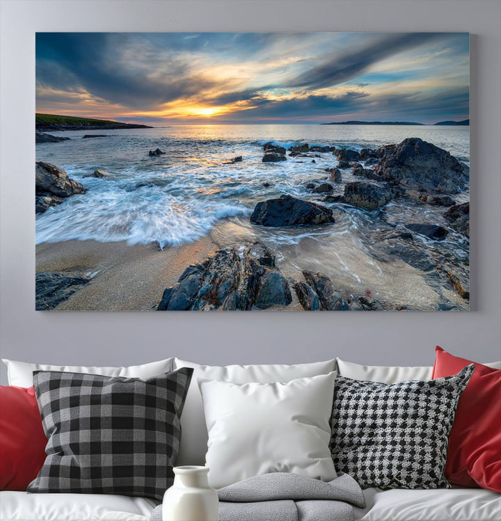 The "Beautiful Stormy Sunset at Bagh Steinigidh Beach Stones" triptych ocean-themed wall art is displayed on museum-quality canvas and features a UV-protective coating.