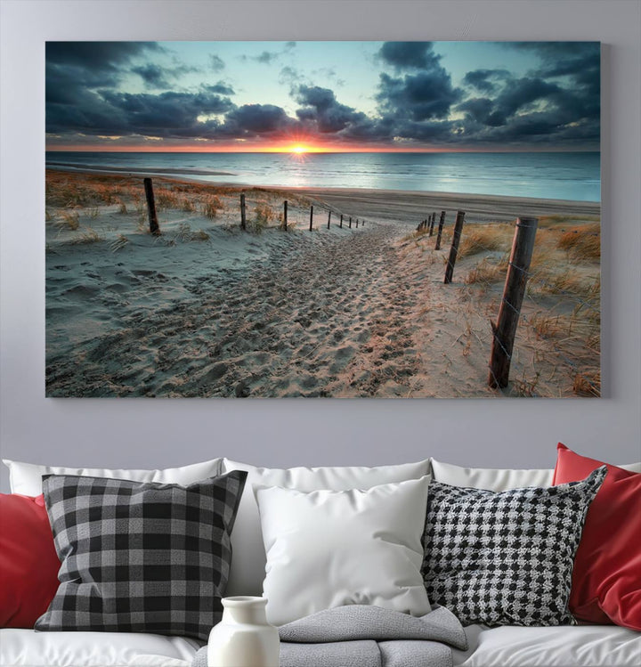 The modern living room features the Cloudy Weather Sunset Beach Wall Art Canvas Print. This museum-quality canvas adds a touch of sophistication with its hand-assembled framed art, ensuring lasting elegance. Enjoy free shipping on this exquisite piece.