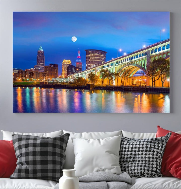 The Cleveland Night Skyline Wall Art City Cityscape Canvas Print portrays a city skyline and bridge lit up against the night sky. This artwork is printed on museum-quality canvas with a gallery-wrapped finish and features a UV-protective coating to ensure lasting vibrancy.