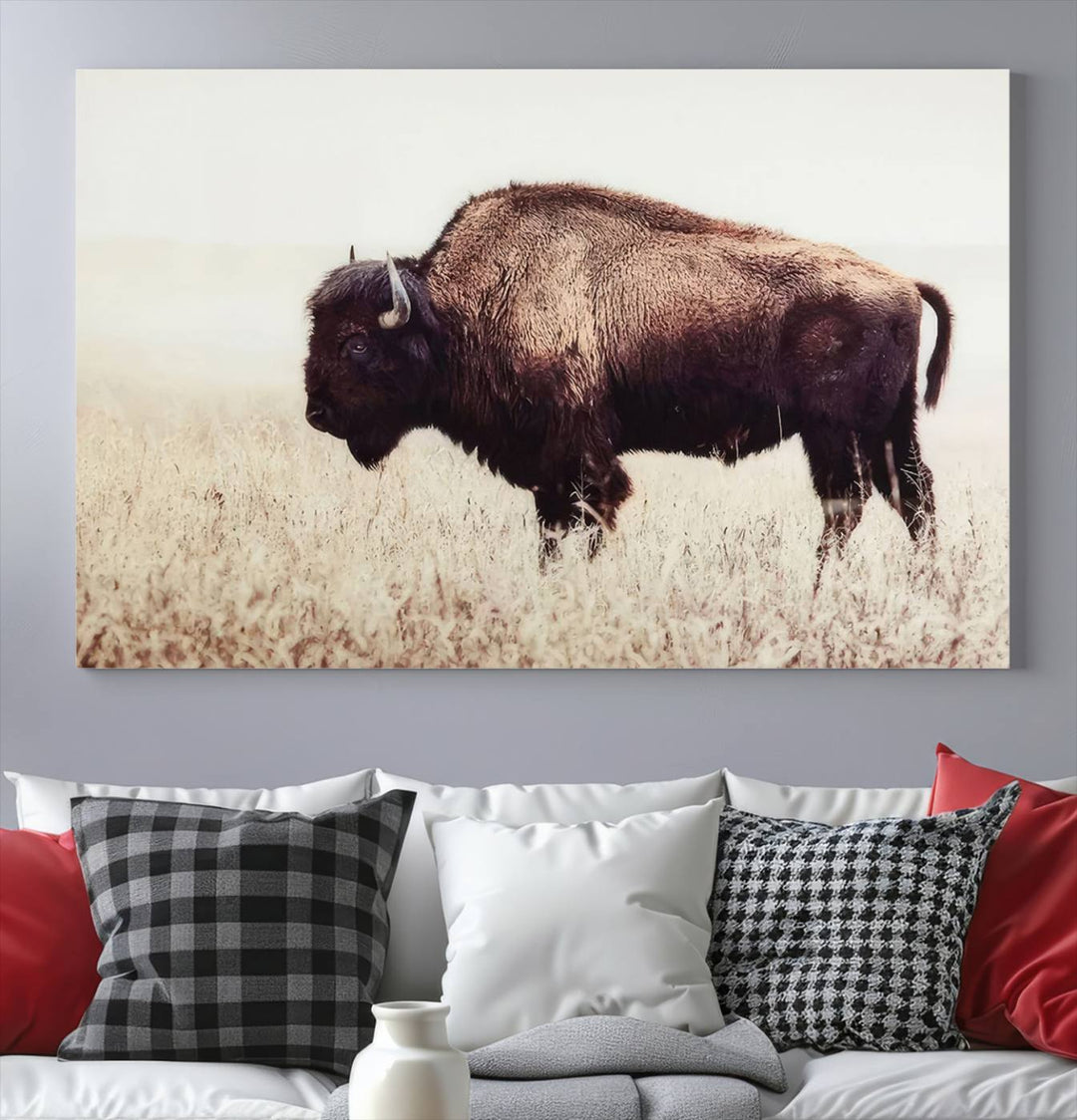 A stylish living room showcases the captivating "Bison in Field" Wall Art Canvas Print as farmhouse decor.