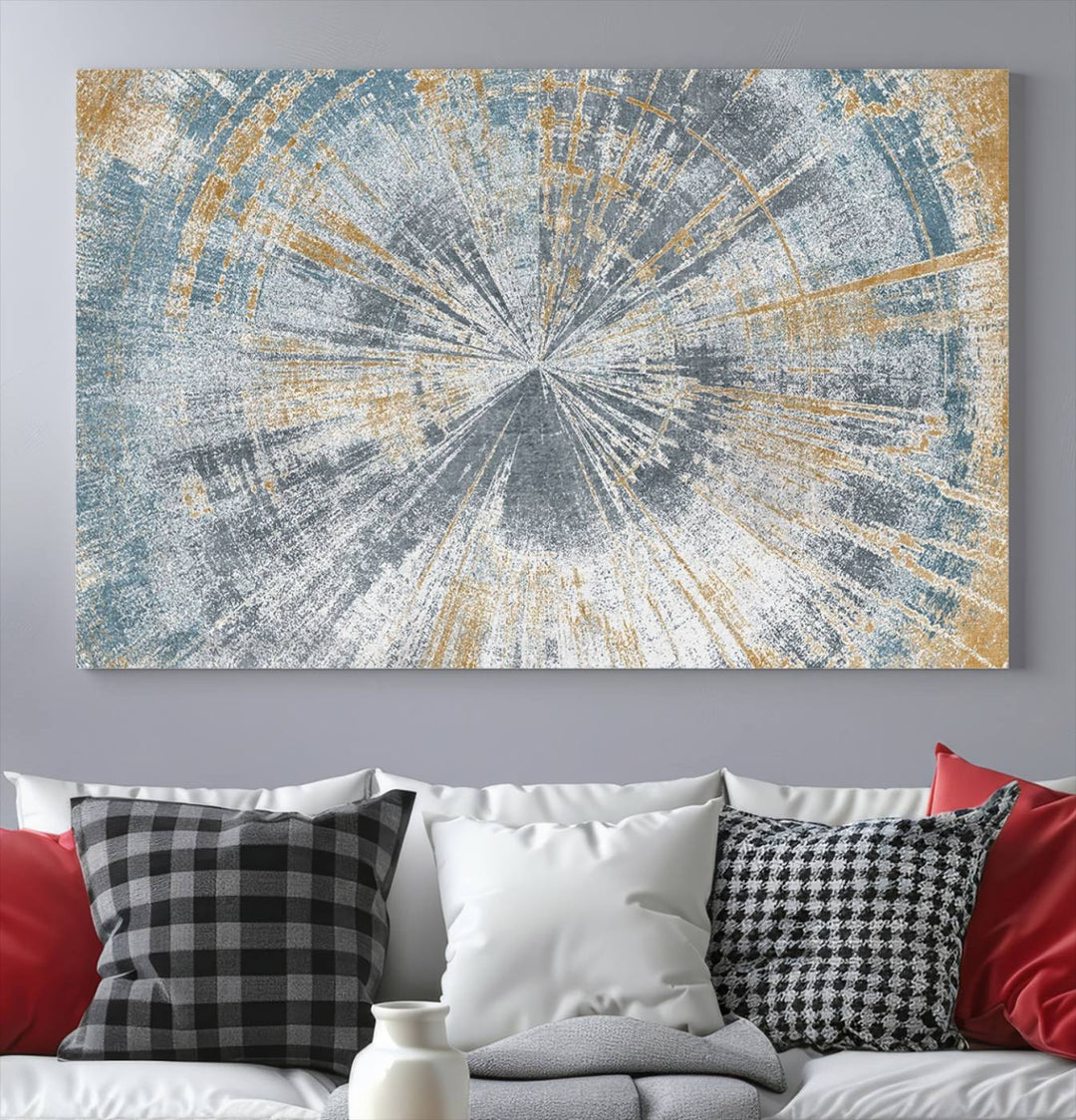 The Radiant Abstract Wood Rings Canvas Art, a modern triptych wall decor, enhances the contemporary style of the living room with its blue, white, and gold hues.