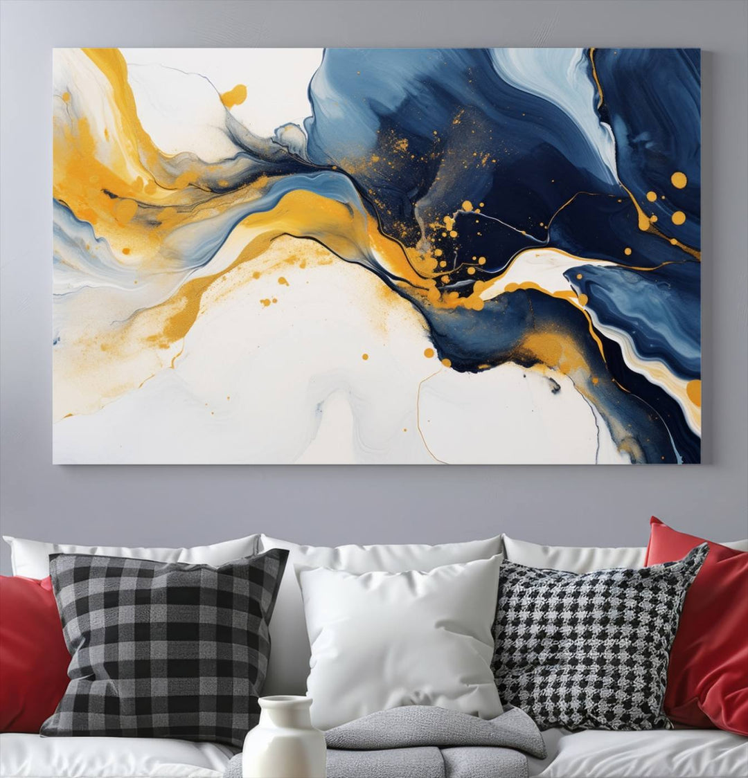 The Blue and Gold Abstract Fluid Canvas Art, with its swirling patterns, adorns the wall. This modern wall art beautifully complements the contemporary interior decor, adding an elegant touch with its rich blue, gold, and white tones.