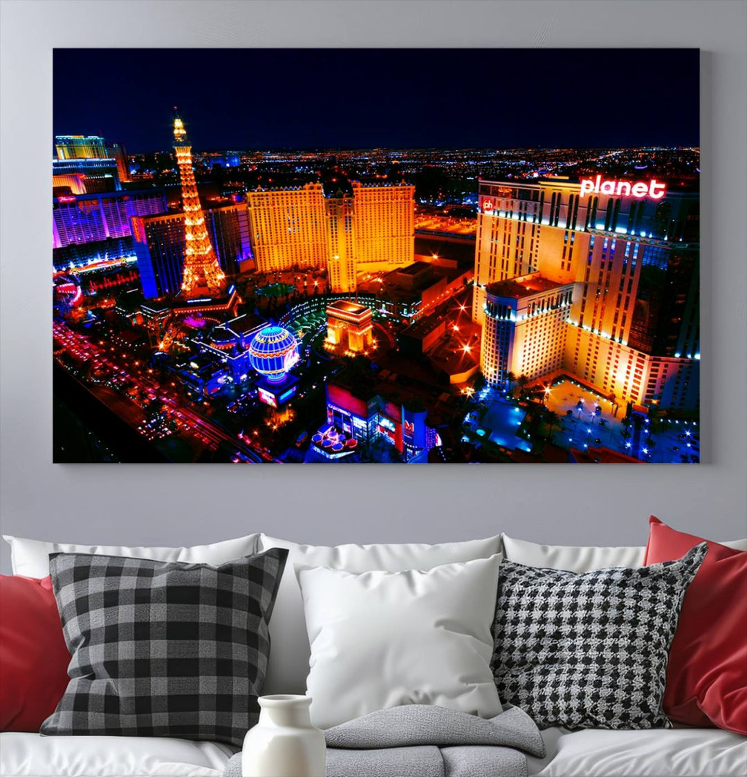 Las Vegas Wall Art Canvas Print showcases a dynamic and luminous cityscape at night with tall buildings and bustling streets. Expertly printed on museum-quality canvas, this gallery-wrapped artwork is enhanced with a UV-protective coating to ensure lasting brilliance.