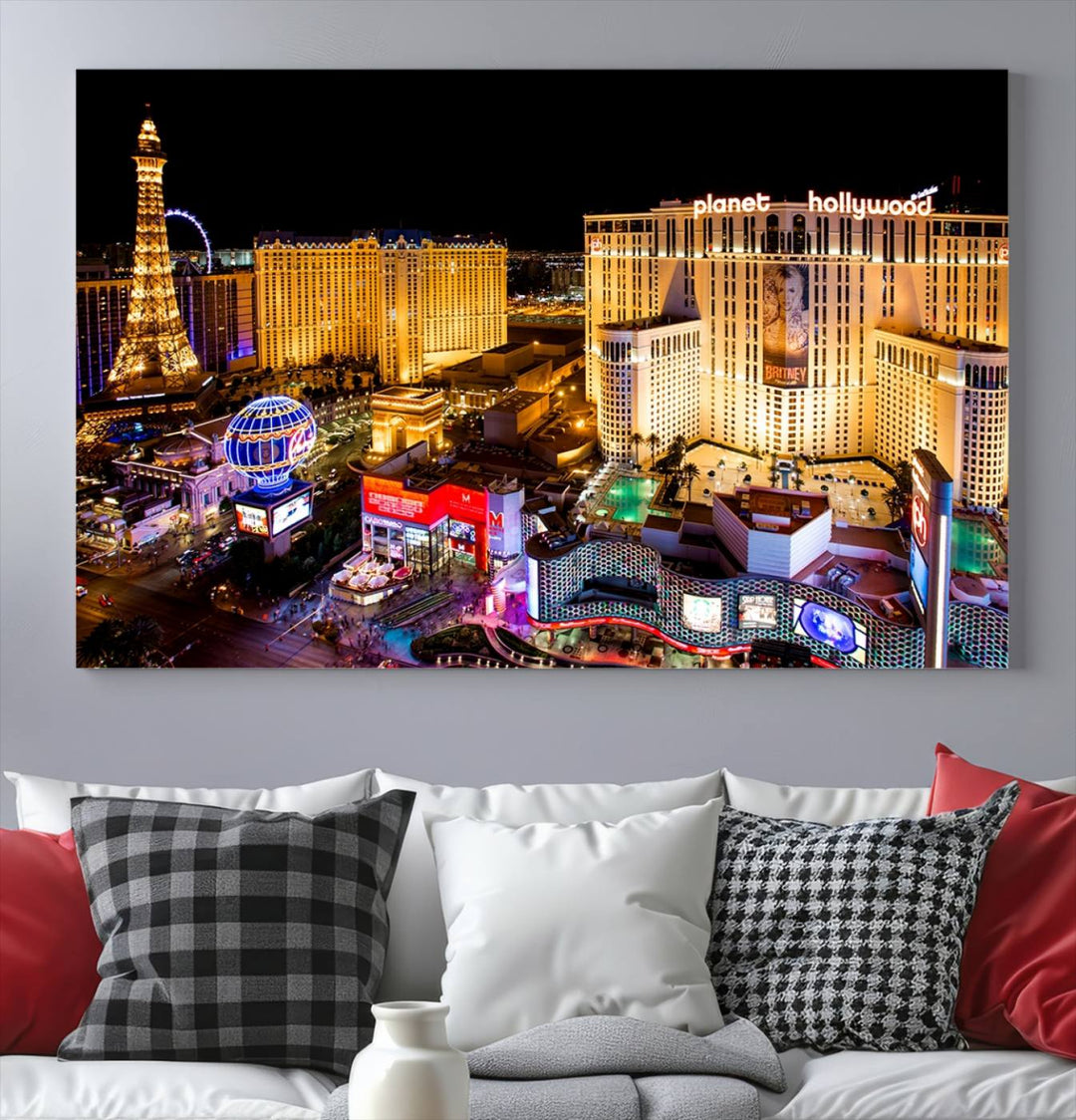 The Las Vegas Wall Art Canvas Print is a triptych set that showcases a stunning night view of Las Vegas. The illuminated buildings and the iconic faux Eiffel Tower add elegance to any space. Each piece comes with a UV-protective coating and is ready to hang, ensuring both style and durability.