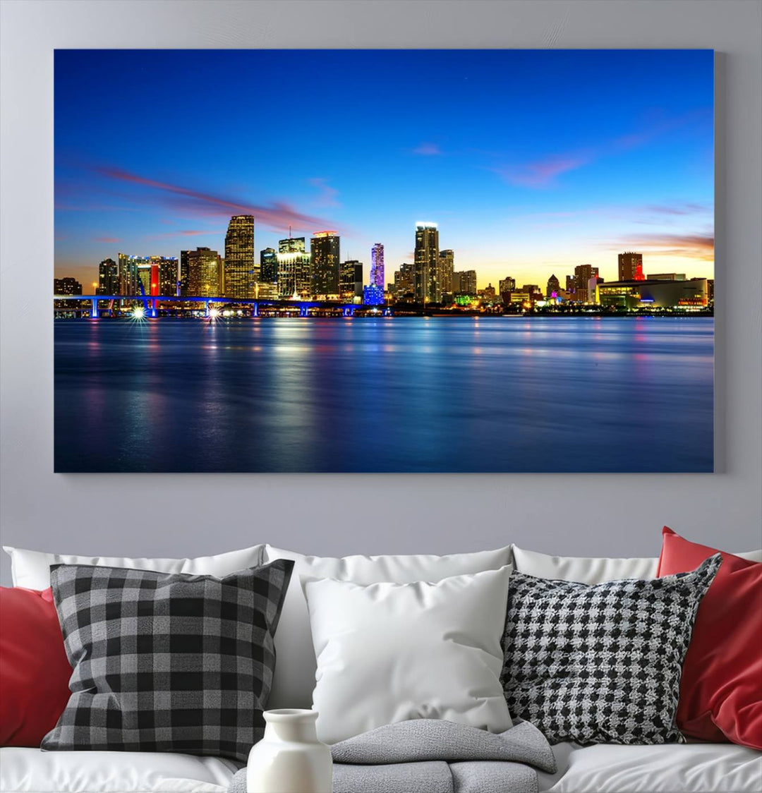 The living room features a Miami City Wall Art Canvas Print—a gallery-wrapped triptych displaying a city skyline at dusk, adding museum-quality elegance to the space.