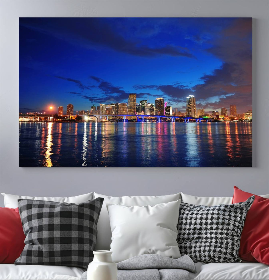 A large Miami City View Wall Art Canvas Print featuring the Miami City Skyline Panorama at night is displayed above the dresser.