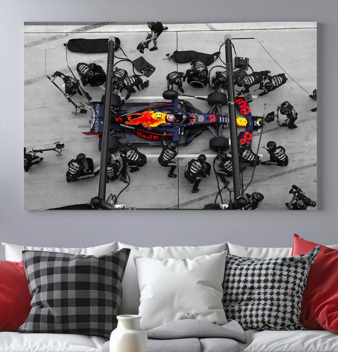 The RedBull Formula 1 Canvas Wall Art Print, a set of three gallery-quality pieces, elegantly adorns the wall.