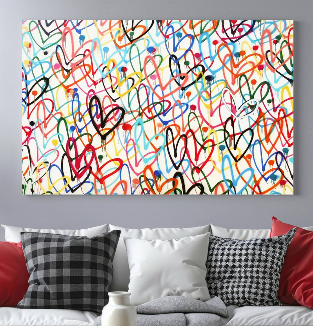 The "Colorful Love Canvas print," featuring vibrant abstract street art with overlapping loops, is handmade in the USA.