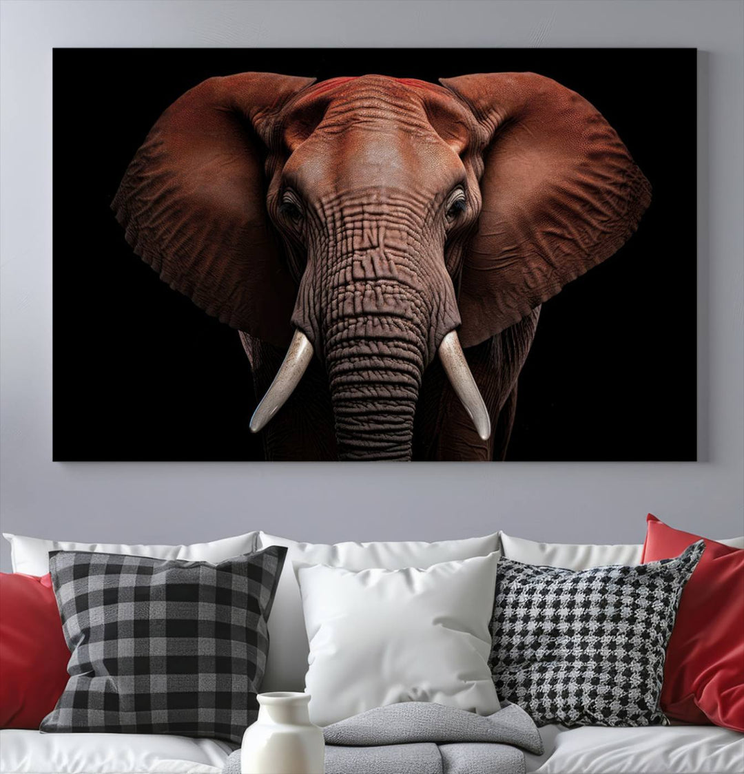 A stunning triptych titled "Wild Elephant Wall Art Canvas Print" beautifully enhances the wall above a contemporary living room. This Africa Savannah Wild Animal Wall Decor Print is of museum-quality, complete with a UV-protective coating to ensure its vibrancy and beauty are preserved for years.