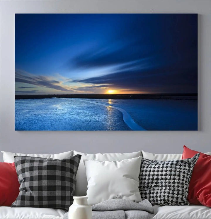 The living room features a triptych of the Wall Art Canvas Print Navy Sunset Lake Landscape Artwork, adding to its tranquil vibe.