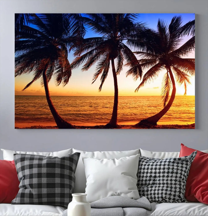 The living room features a wall adorned with the "Wall Art Canvas Curve Palms at Sunset on Beach," showcasing gallery-wrapped, museum-quality canvases in a stunning triptych.