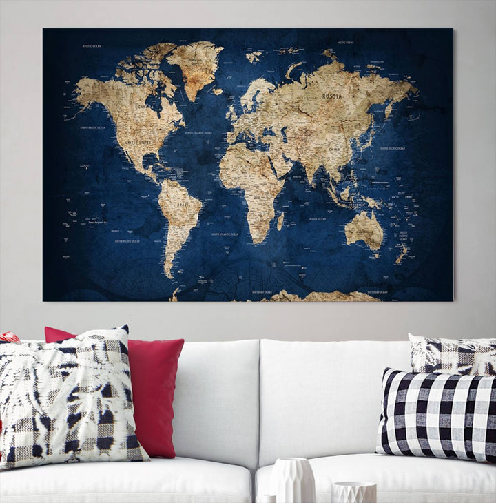 A triptych canvas print titled "Vintage Blue World Map Canvas Print - Classic World Map Design on Deep Blue Wall Art Print" adorns the wall, enhancing the decor with its antique style.