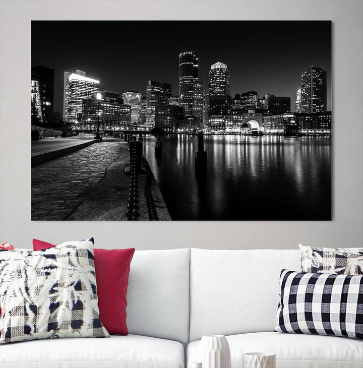 The Boston Lights Skyline Black and White Wall Art Cityscape Canvas Print, crafted with museum-quality canvas and UV-protective coating, serves as a striking triptych centerpiece in the living room.