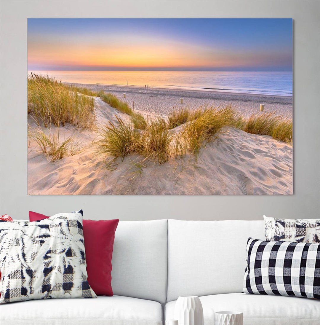 The "Sunset Silence on the Beach" wall art canvas print features a serene beach scene at sunset on museum-quality canvas with a UV-protective coating.