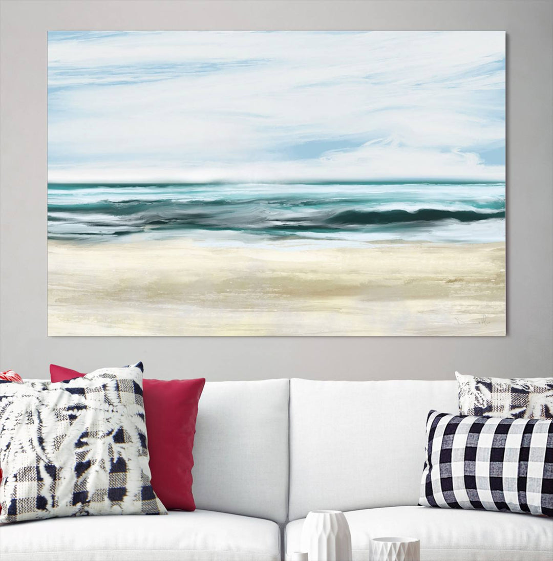 The room features the Ocean Abstract Wall Art Canvas Print, a triptych beach painting on museum-quality canvas with a gallery-wrapped finish and UV-protective coating.