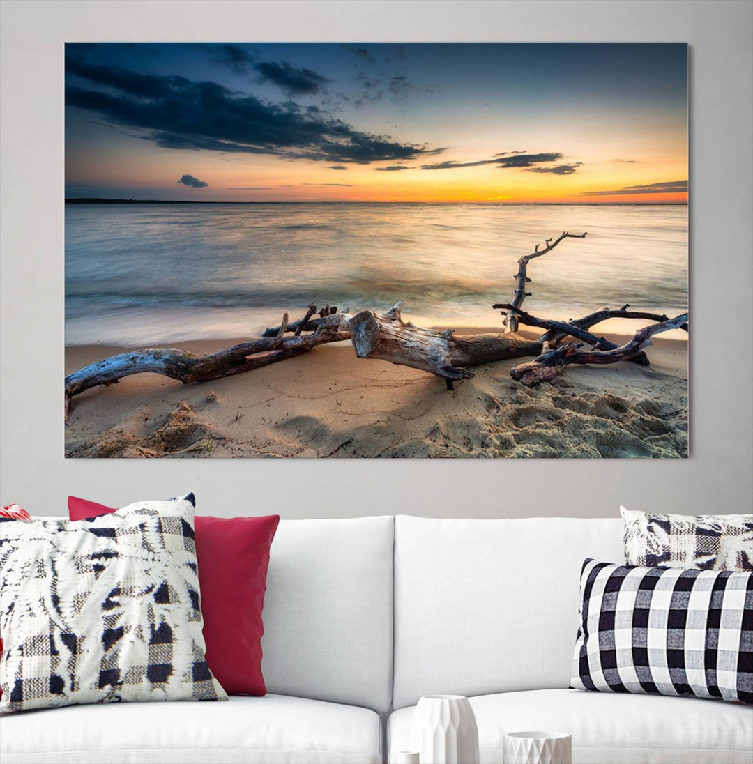 A captivating piece of Ocean Sunset Beach Wall Art Canvas Print, gallery wrapped, graces the gray wall.