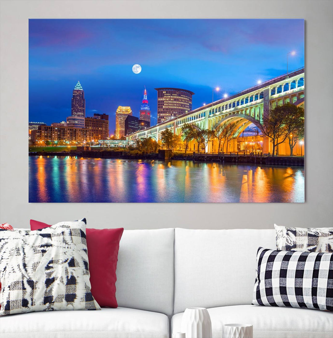 The Cleveland Night Skyline Wall Art City Cityscape Canvas Print portrays a city skyline and bridge lit up against the night sky. This artwork is printed on museum-quality canvas with a gallery-wrapped finish and features a UV-protective coating to ensure lasting vibrancy.