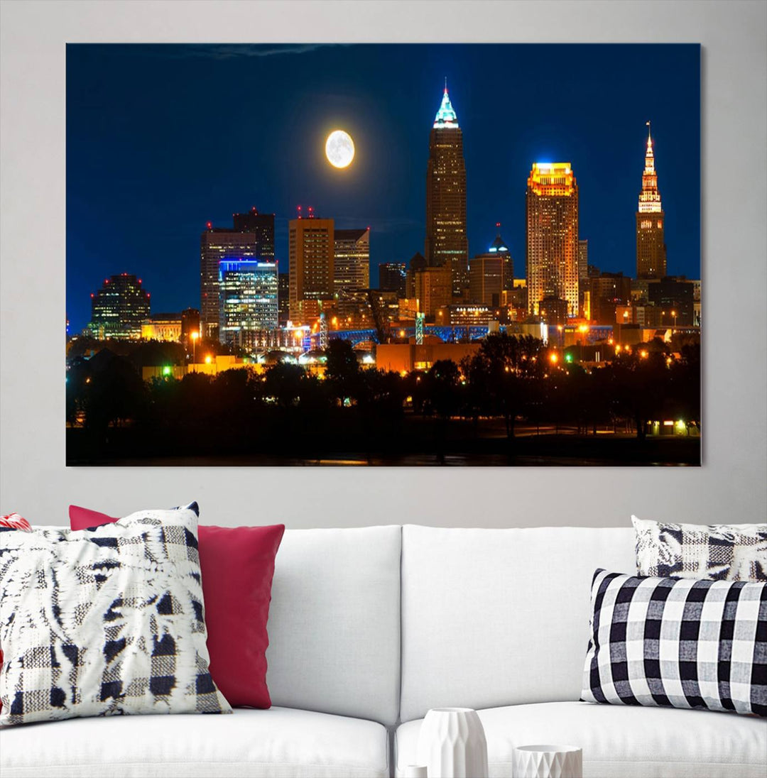 The "Cleveland Night Skyline Wall Art City Cityscape Canvas Print" adds elegance to the room with its depiction of a city skyline and full moon on museum-quality canvas. The artwork is enhanced by a UV-protective coating to ensure lasting brilliance.