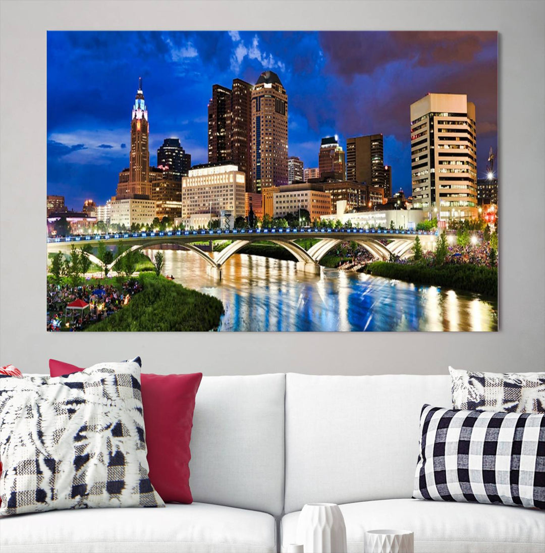 The Columbus City Lights Night Bright Blue Cloudy Skyline Cityscape View Wall Art Canvas Print, crafted on museum-quality canvas and finished with a UV-protective coating, adorns the wall.